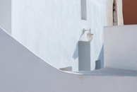 Modern interior featuring a matte decorative stucco wall in creamy white.