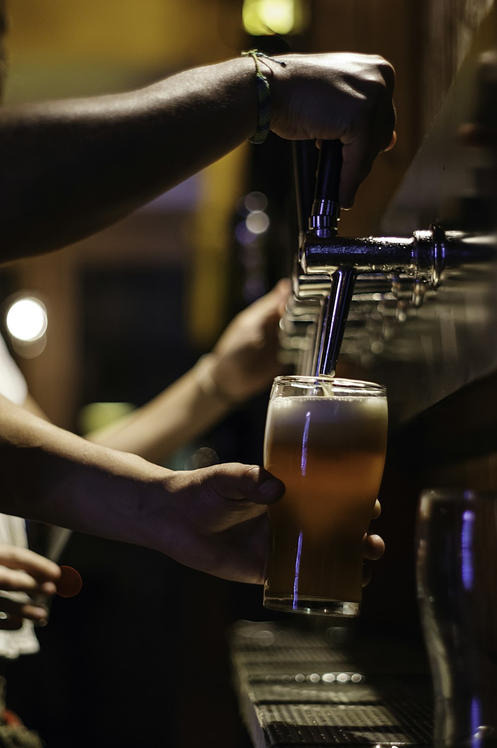 person holding drinking glass