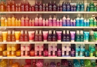 An arrangement of colorful cosmetic product labels.