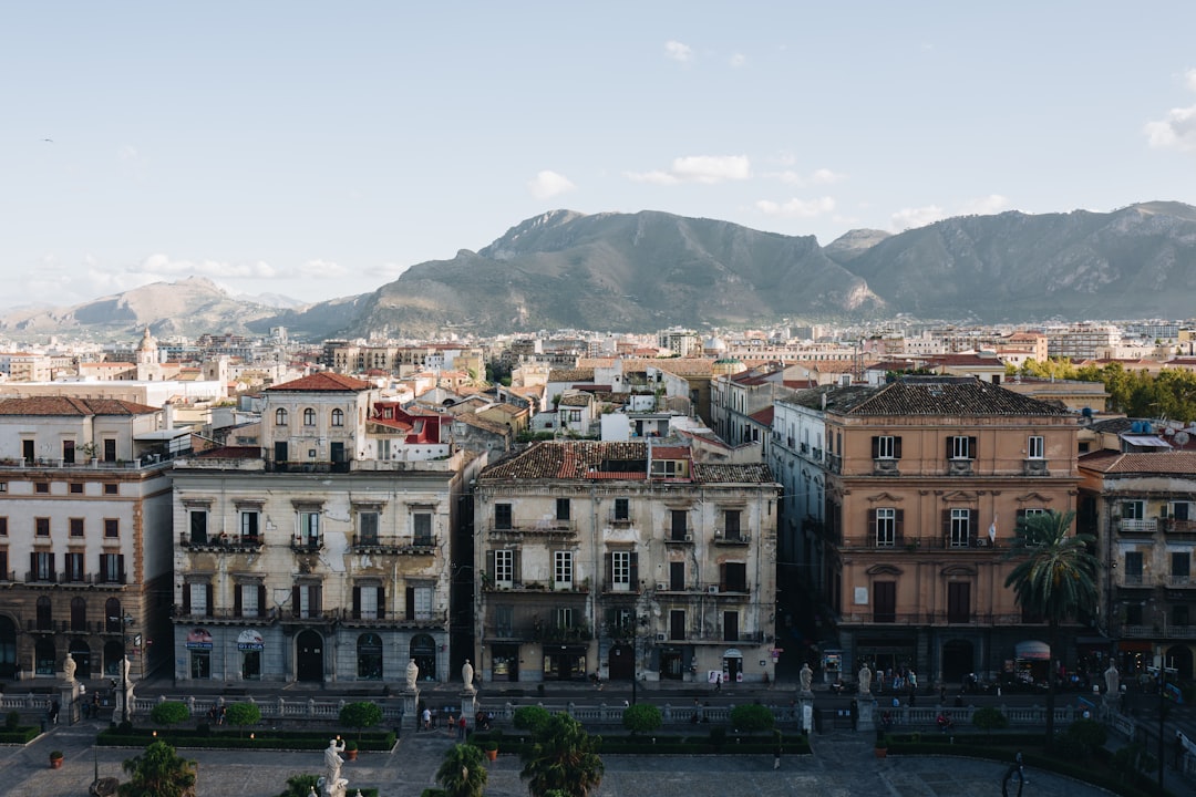 concrete buildings near mountain, Amazing views from Palermo Cathedral. Do you see the composition of the roofs? It’s be