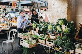man watering vegetables