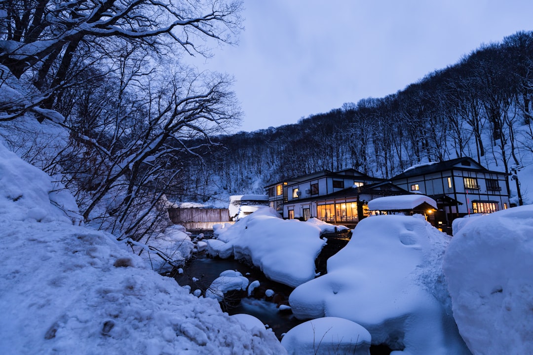 small village covered with snow, Taenoyu Onsen, one of the most famous onsen resort in Nyuto-Onsenkyo, Akita, Japan.<p></figure>(Taken after sunset.)