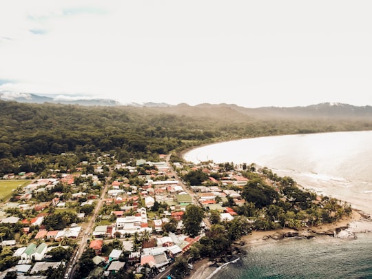 aerial photography of houses beside ocean in Puerto Viejo de Talamanca Costa Rica
