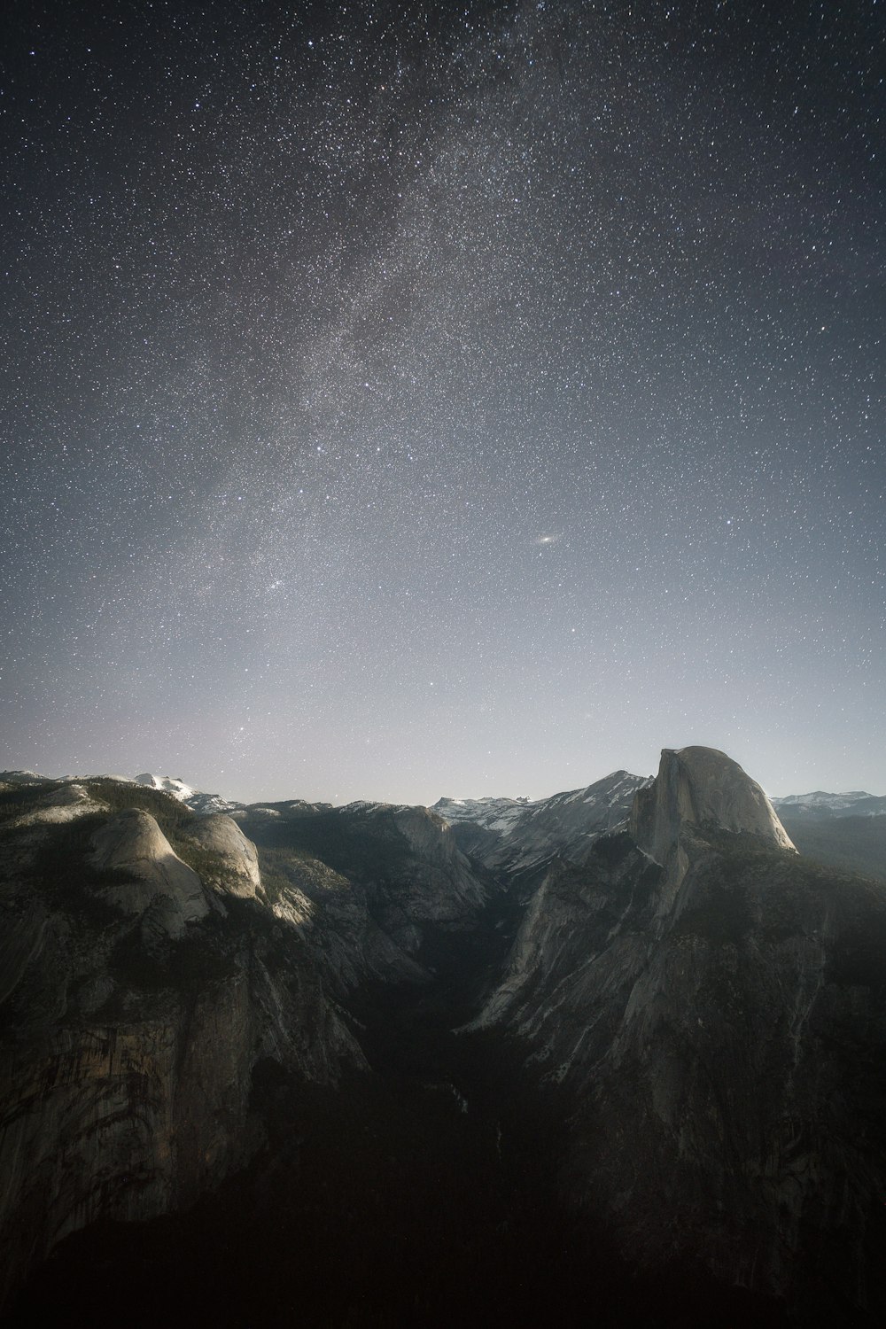 gray mountain under stars