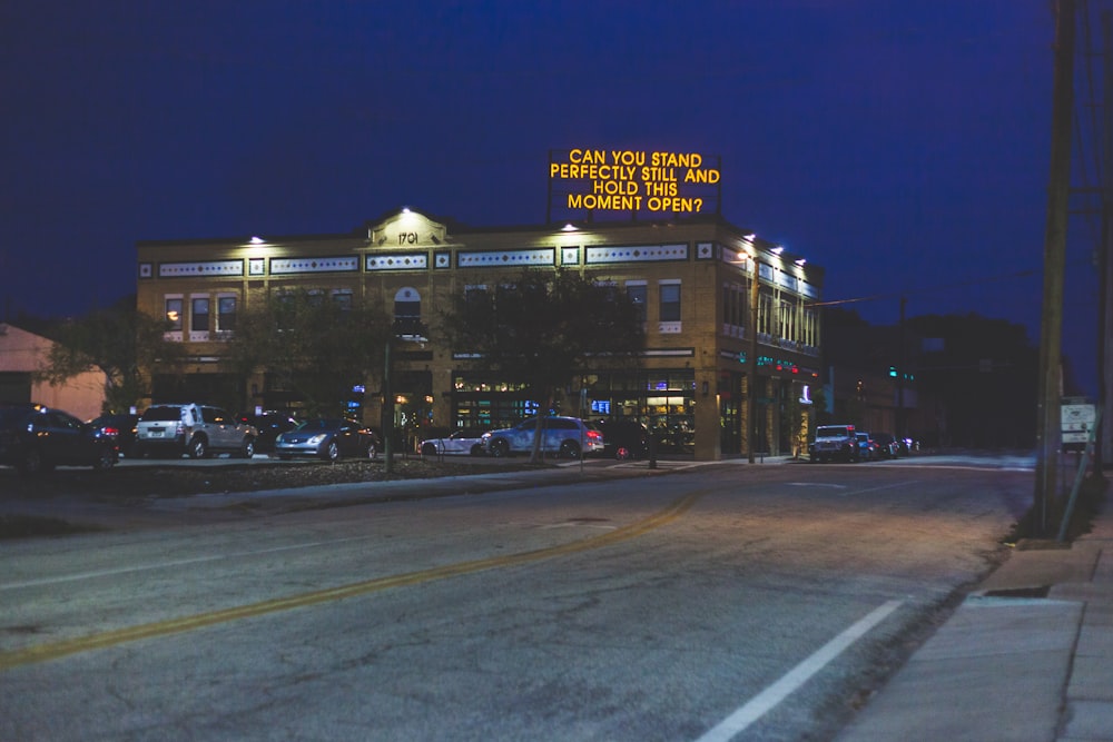 can you stand perfectly still and hold this moment open? building during nighttime