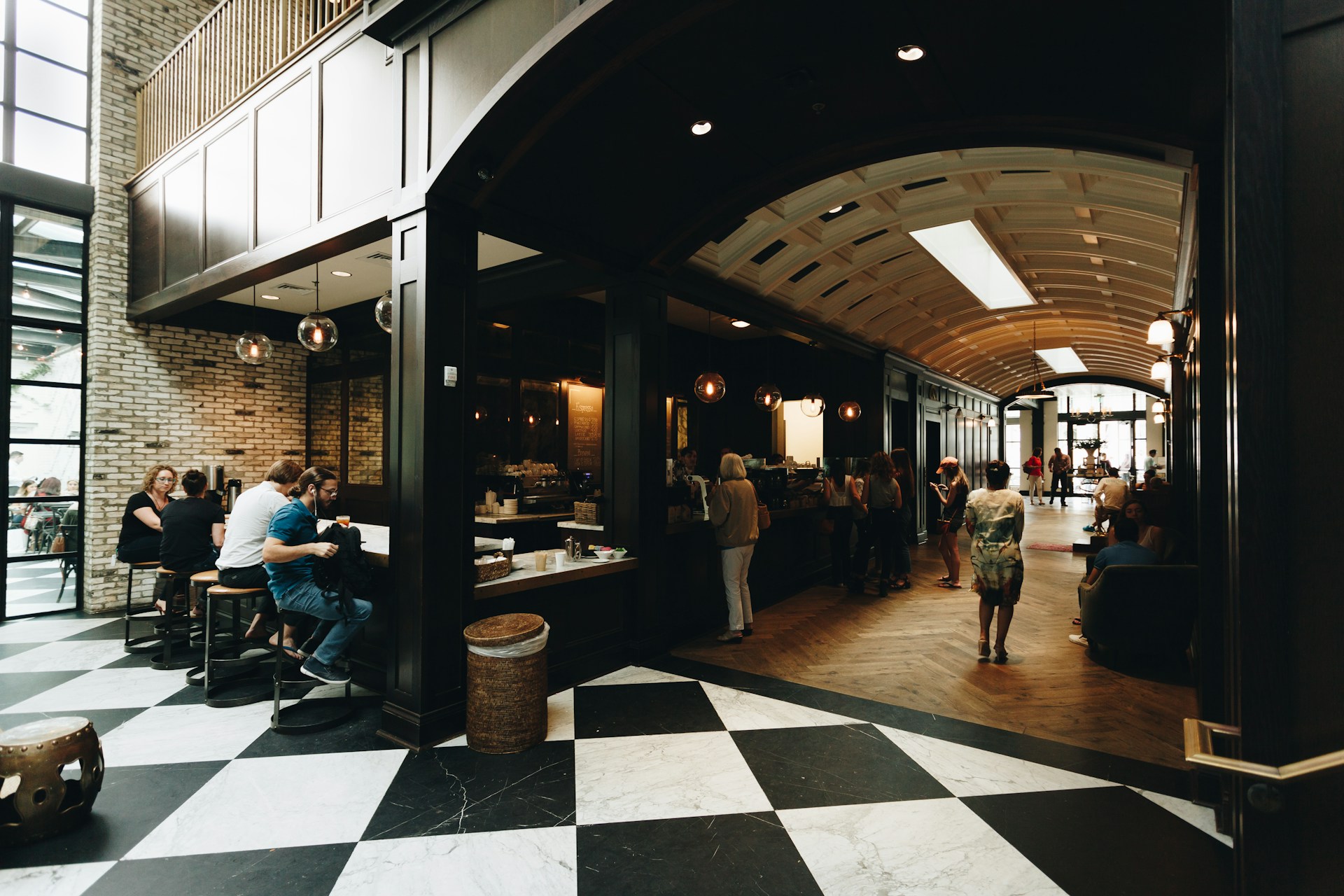woman wearing yellow long-sleeved dress under white clouds and blue sky during daytime