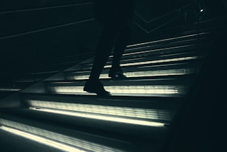 person walking on stairway