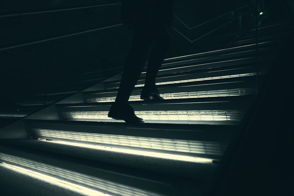 person walking on stairway