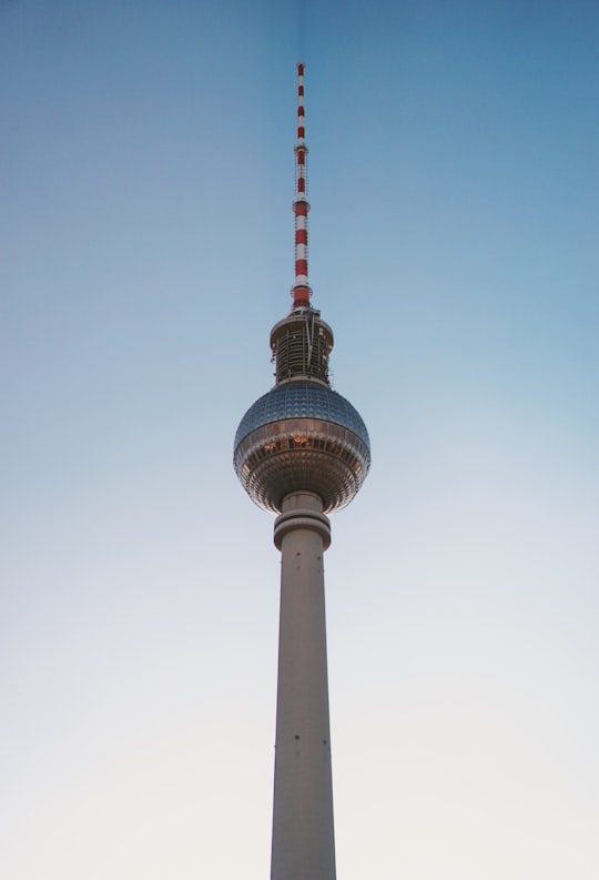 white concrete tower in Fernsehturm Berlin Germany