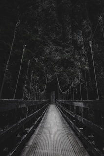 photo of bridge near mountain