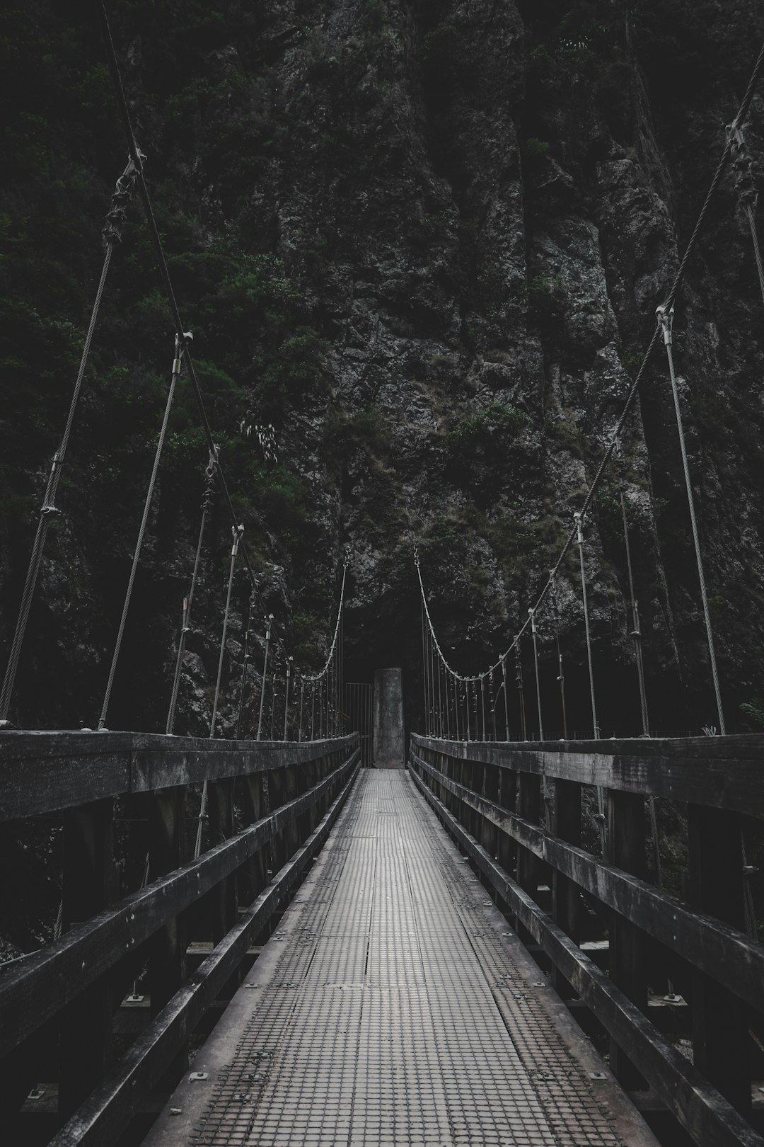 photo of bridge near mountain