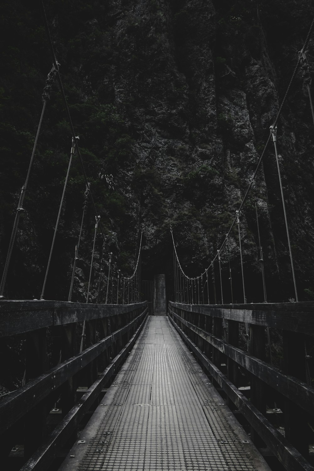 photo of bridge near mountain