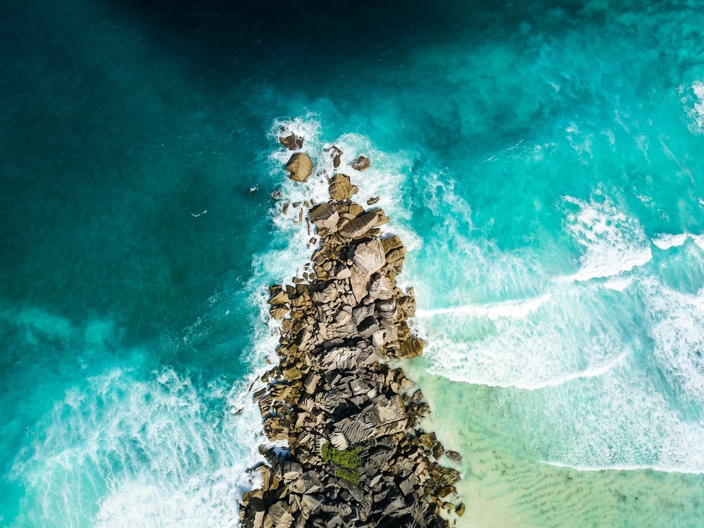 aerial view of rocks near coastline