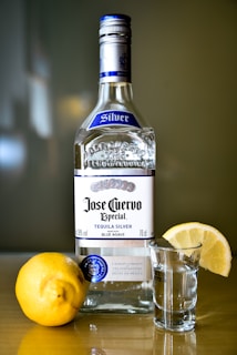 closeup photo of sealed Jose Cuervo tequila silver bottle