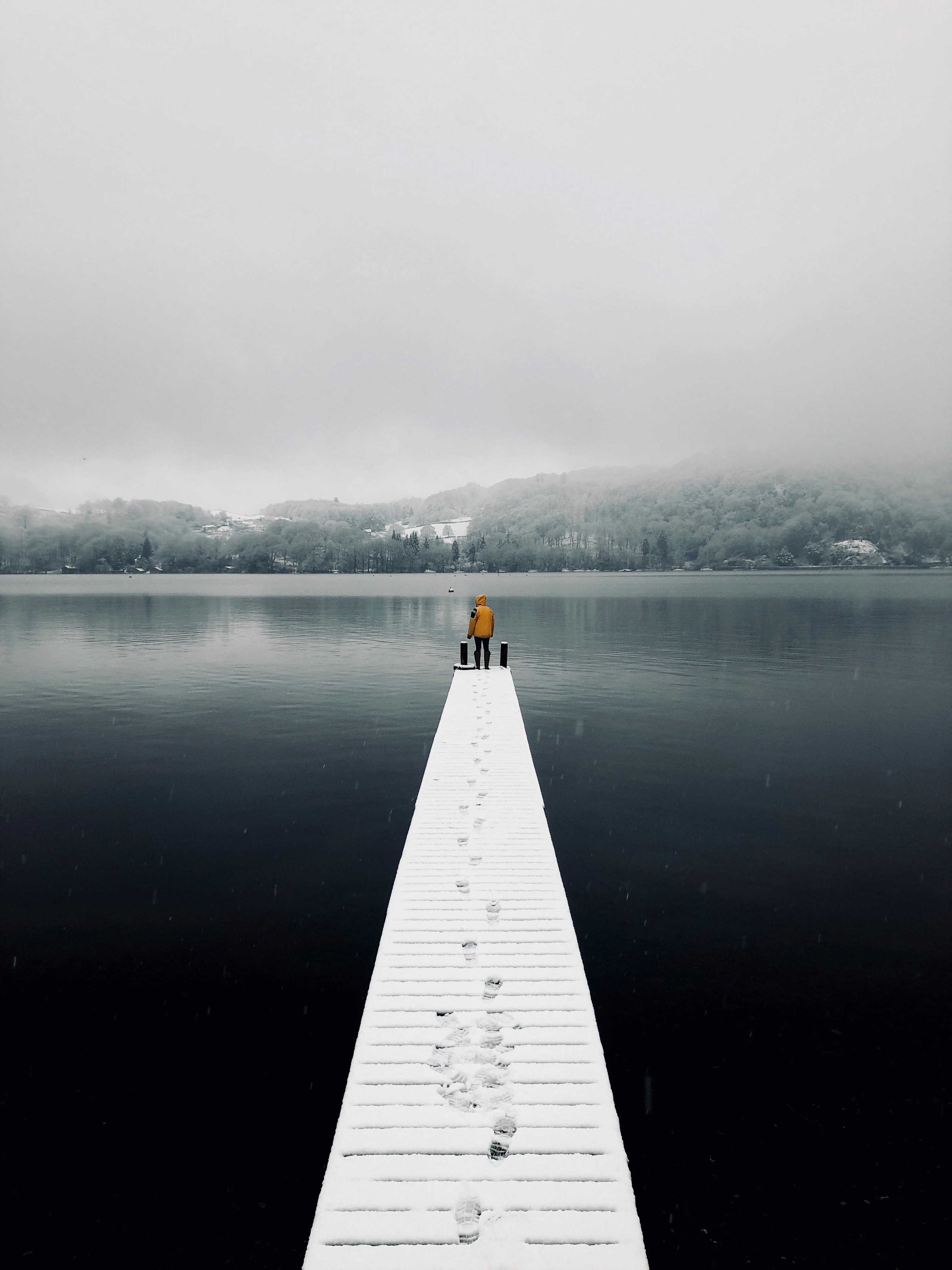 man standing on dock