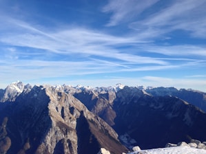 A panoramic view of the Andes mountains under a clear blue sky, perfect for adventurous spirits.