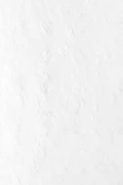 a person riding a snowboard down a snow covered slope