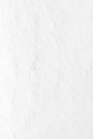 a person riding a snowboard down a snow covered slope