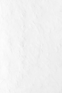 a person riding a snowboard down a snow covered slope