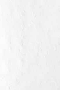 a person riding a snowboard down a snow covered slope