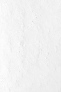 a person riding a snowboard down a snow covered slope