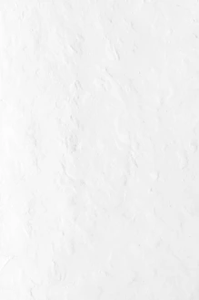a person riding a snowboard down a snow covered slope