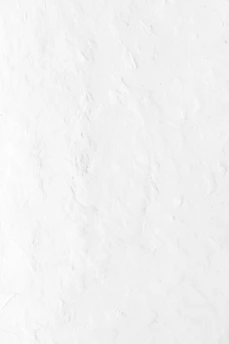 white textured plaster wall surface