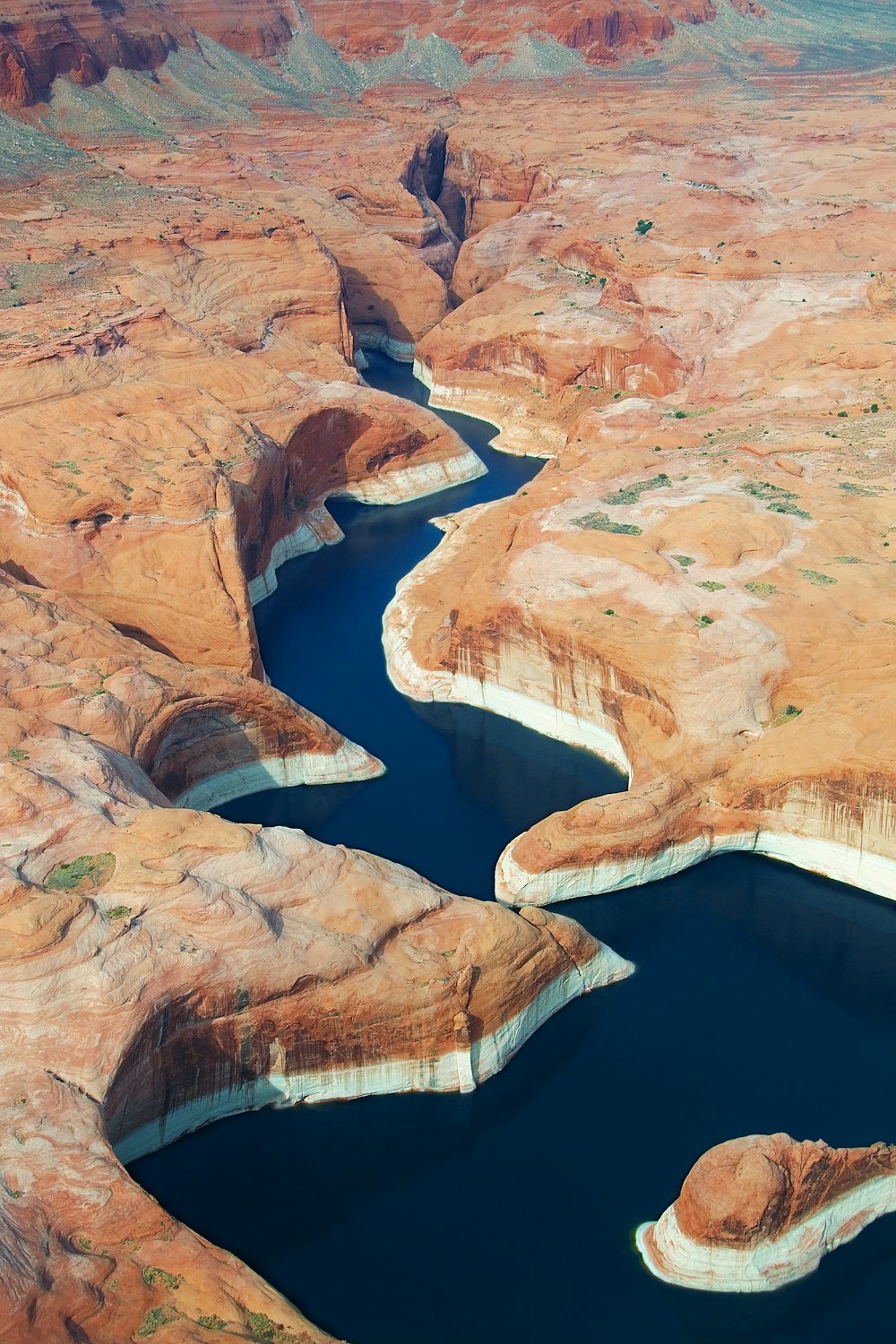 river in between mountains