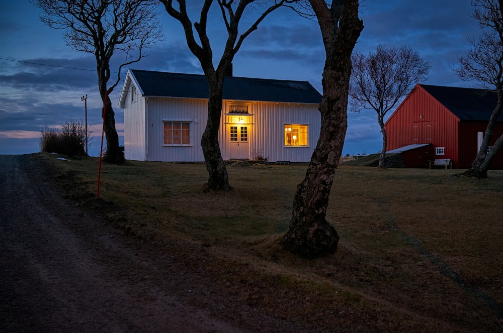 photo of white house beside roadway