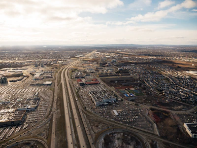 Aerial view of commercial property in Aerocity bustling with activity.