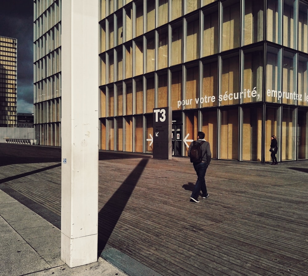 man crossing the road