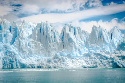 iceberg near body of water icy google meet background