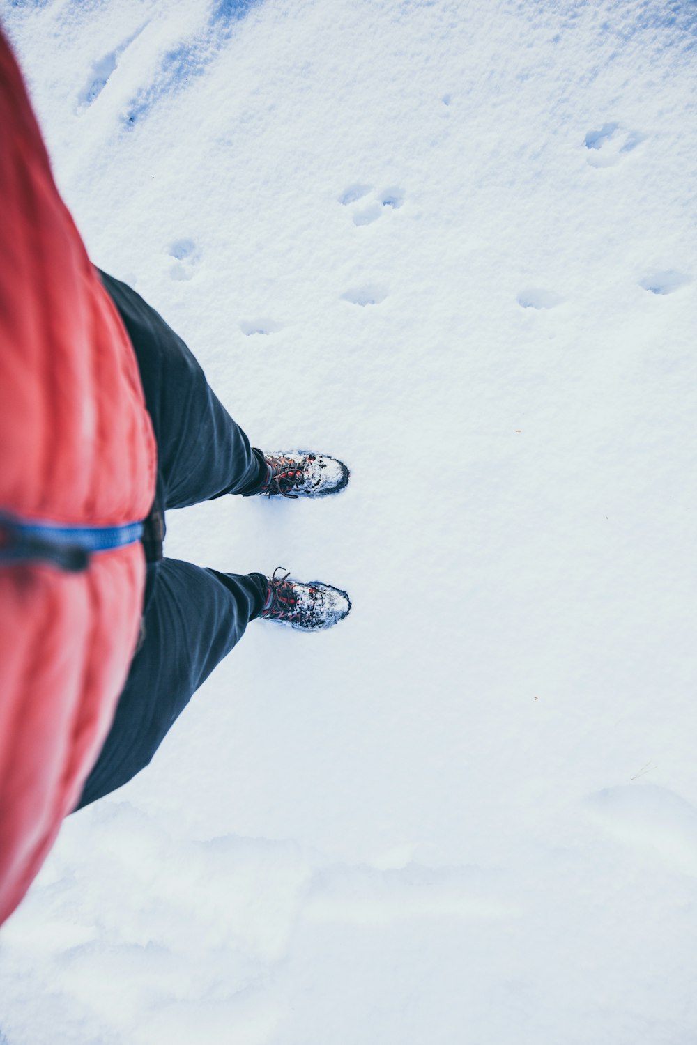 person standing on snow during daytime