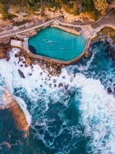 photo of pool near body of water