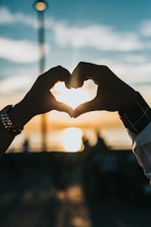 Two hands holding each other representing connection and partnership
