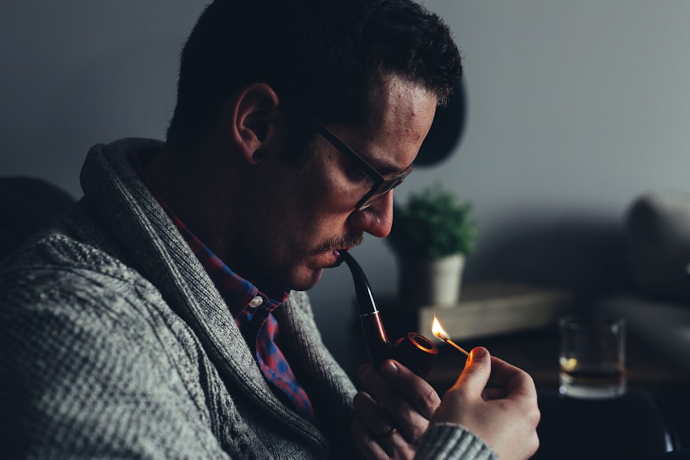 man smoking pipe