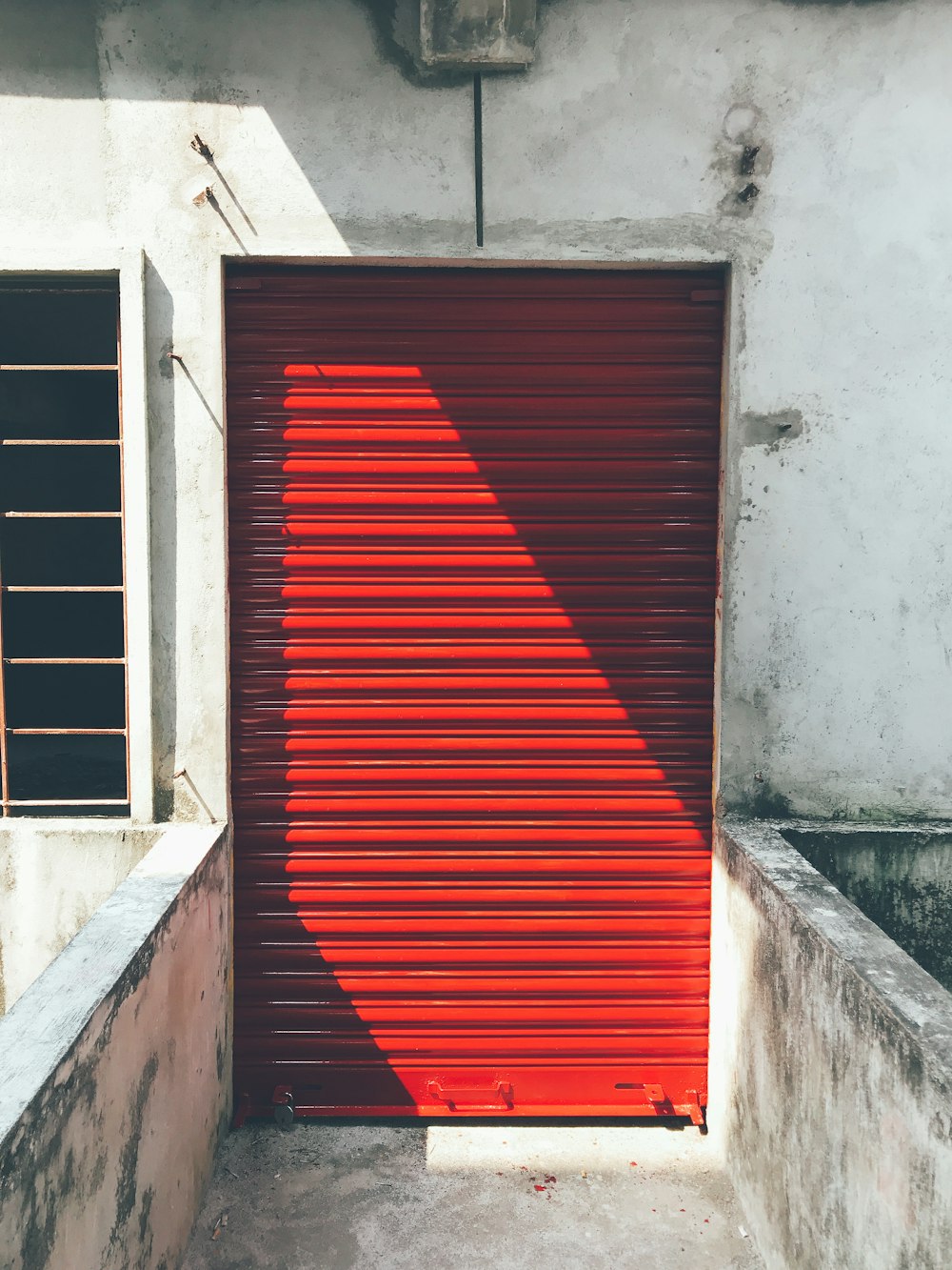 closed red roller shutter