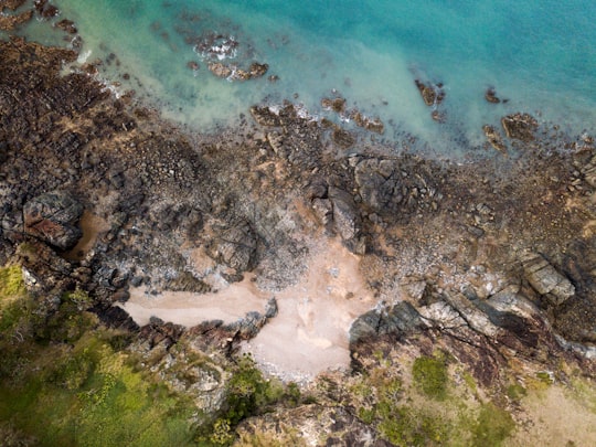 aerial photo of body of water beside cliff in Slade Point Australia