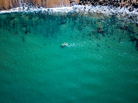 white boat on sea in Slade Point Australia