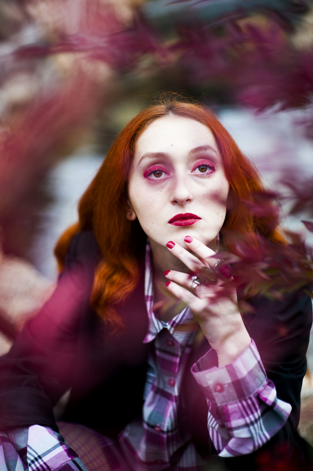 shallow focus photography of woman posing for photo