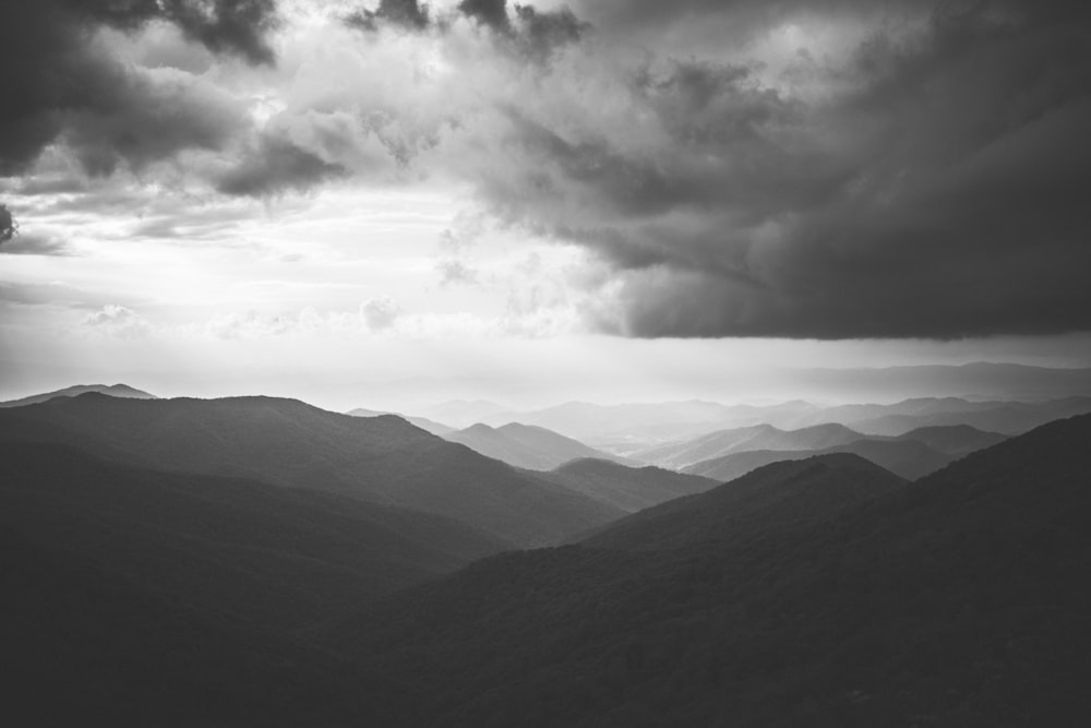 mountains under white sky during daytime