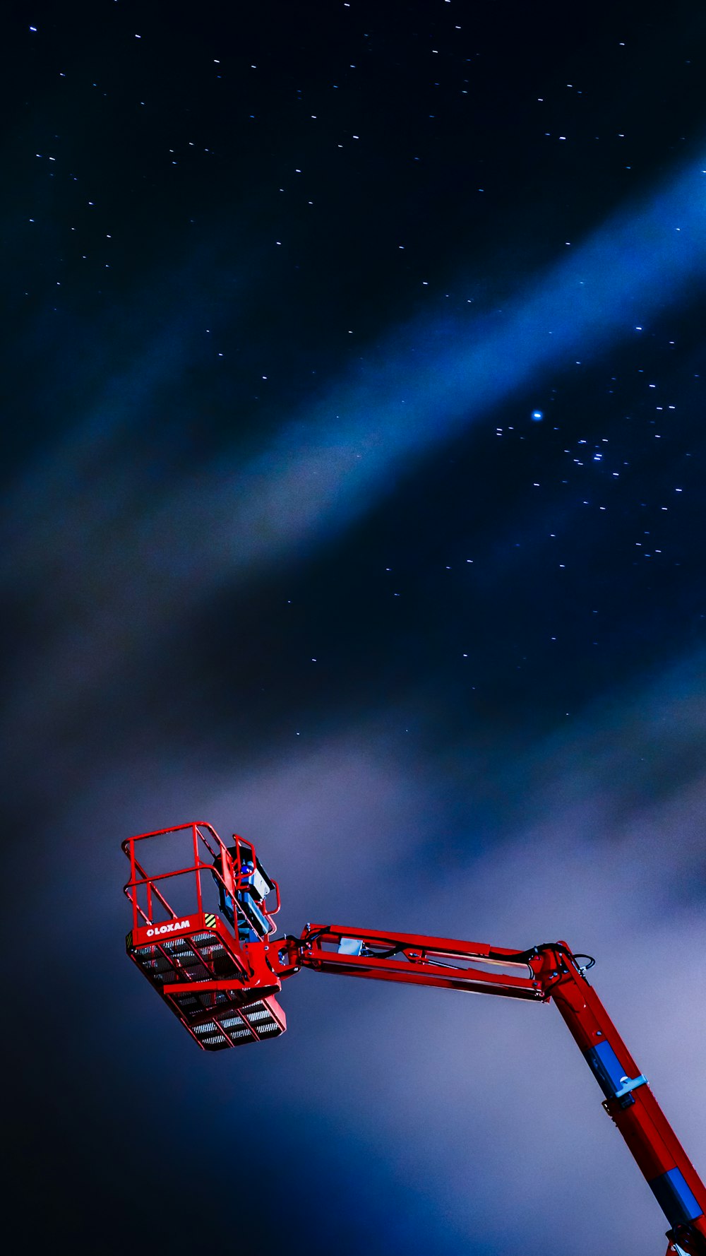 red man lift under starry night