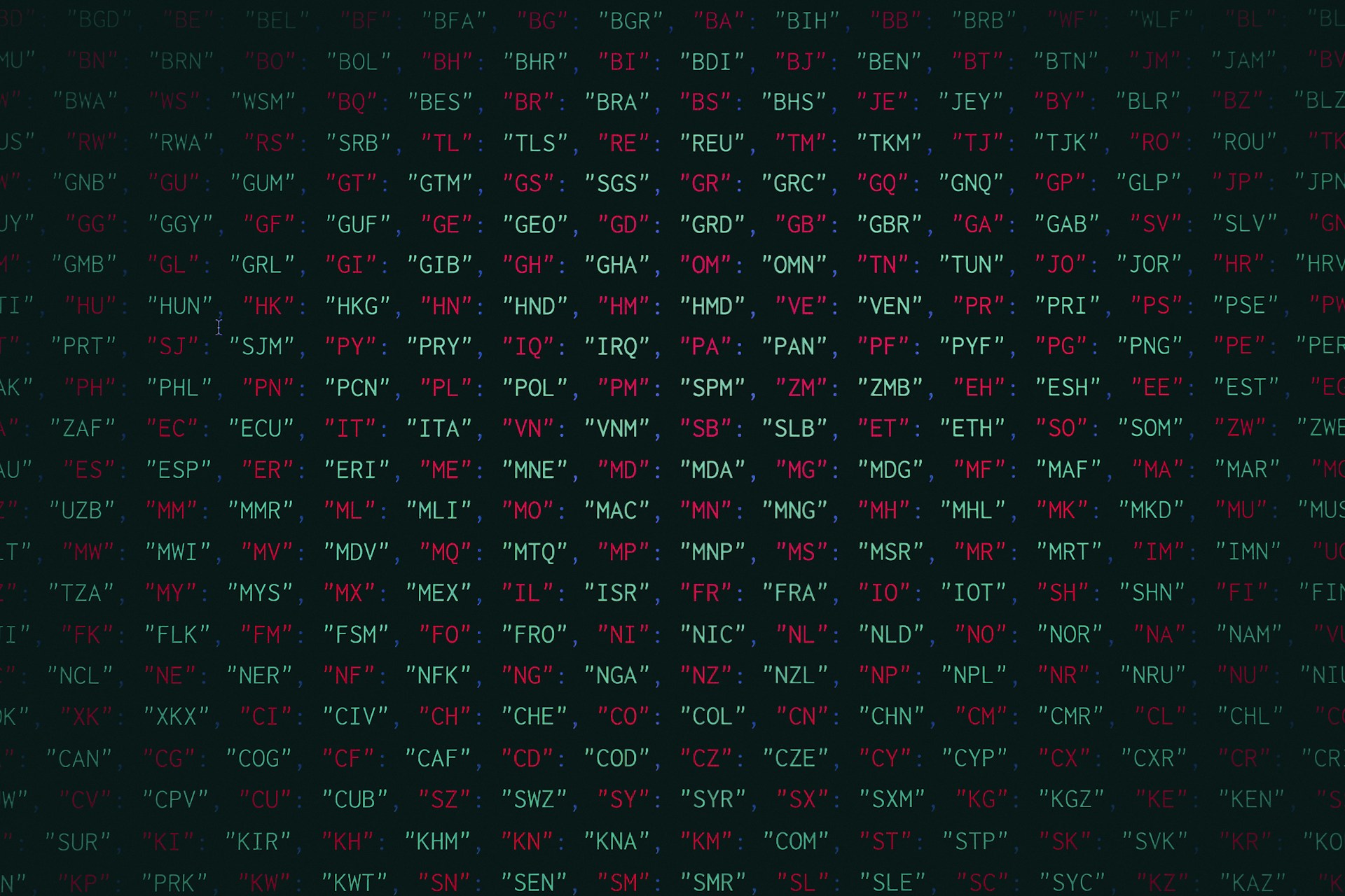 a black background with red and green letters