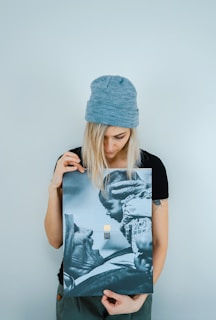 woman holding Mother Teresa holding baby poster