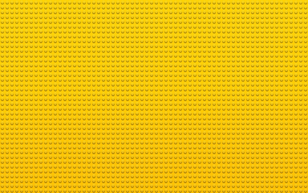 ein gelber Hintergrund mit kleinen Punkten