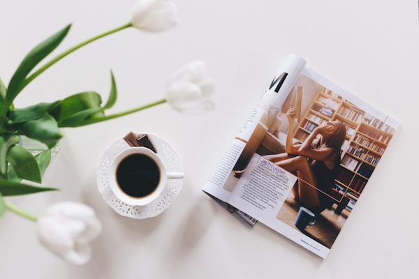 Morning coffee and open journal on a quiet table