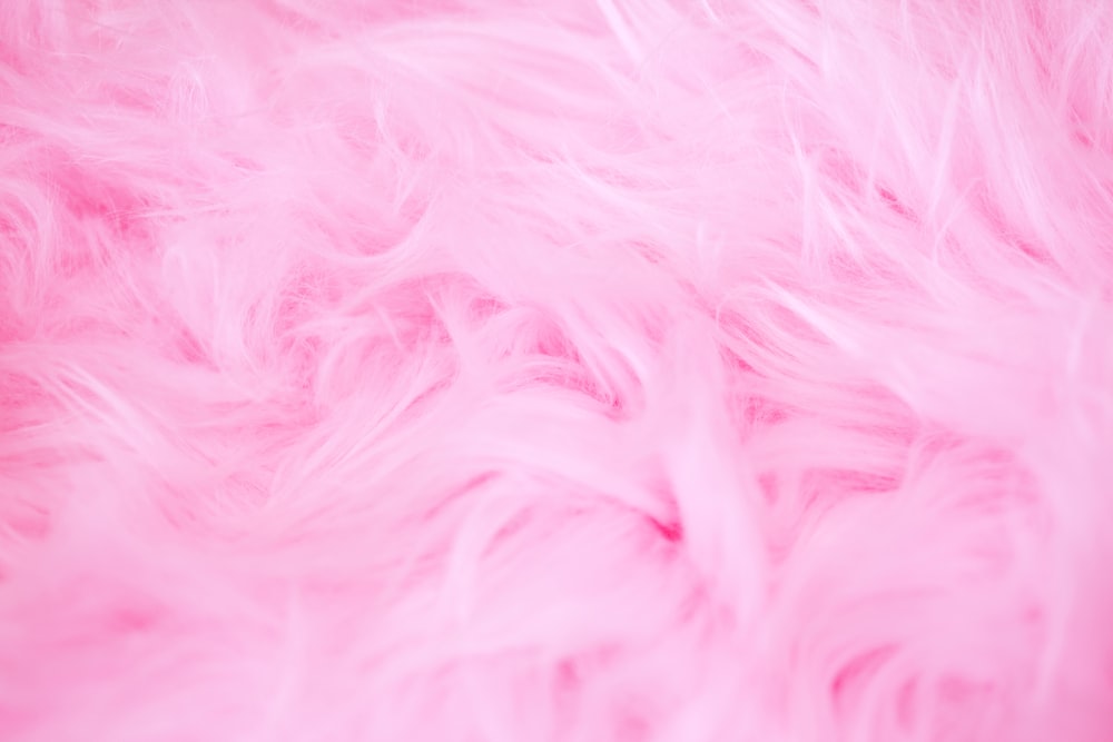 a close up of a pink fur texture