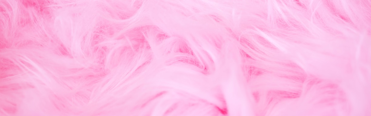 a close up of a pink fur texture