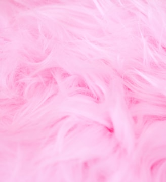 a close up of a pink fur texture