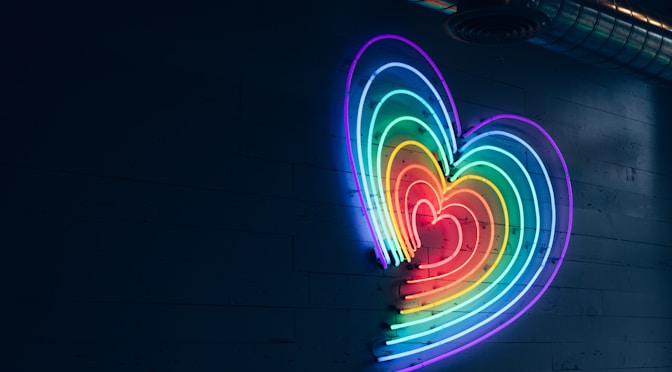 multicolored heart LED light on wall